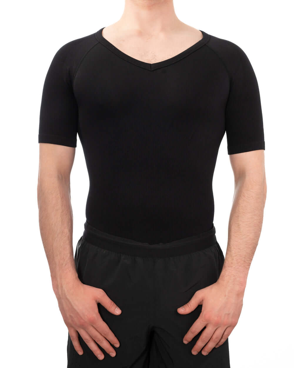 Men's soft compression shirt in black, designed for comfort and discreet wear under clothing.