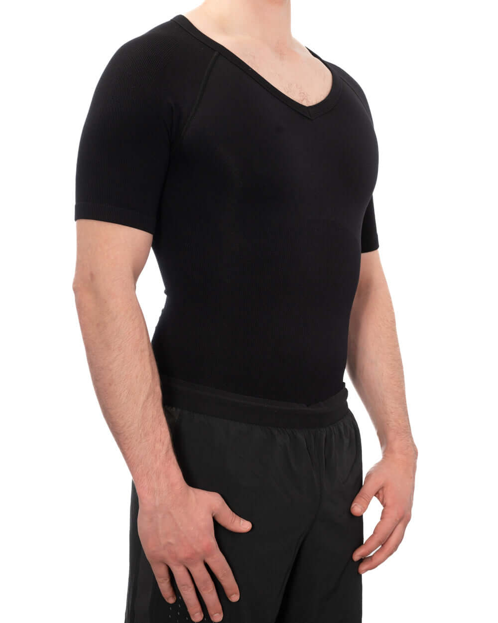 Men's soft compression shirt in black, designed for comfort and discreet under clothing support.