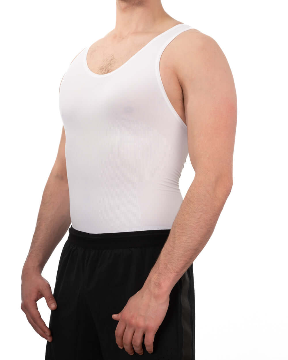 Man wearing a white seamless compression vest, showcasing a taut fit for added confidence and comfort.