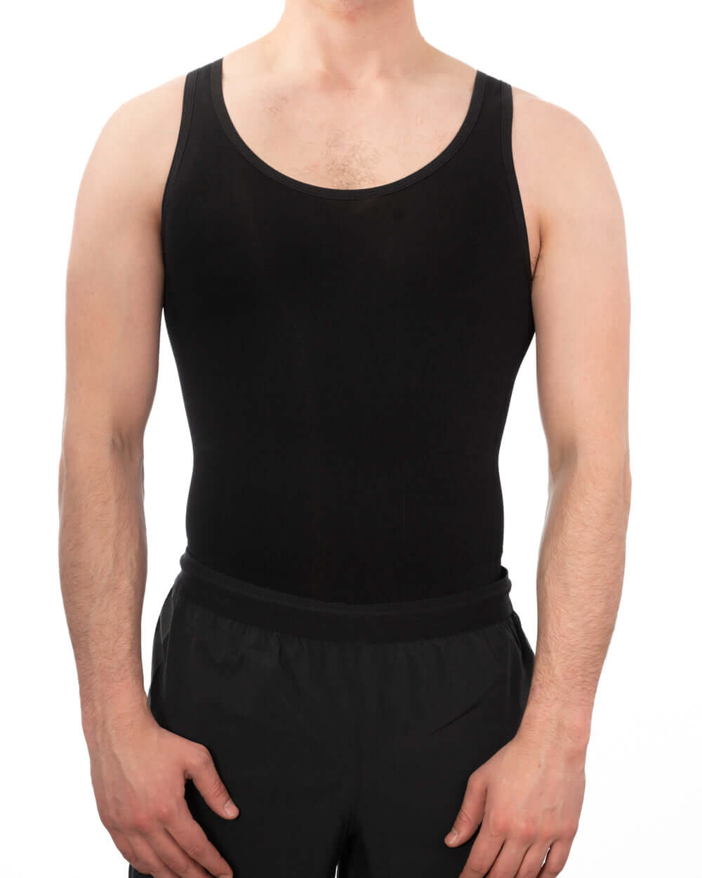 Men's seamless compression vest in black, designed for comfort and control under clothing.