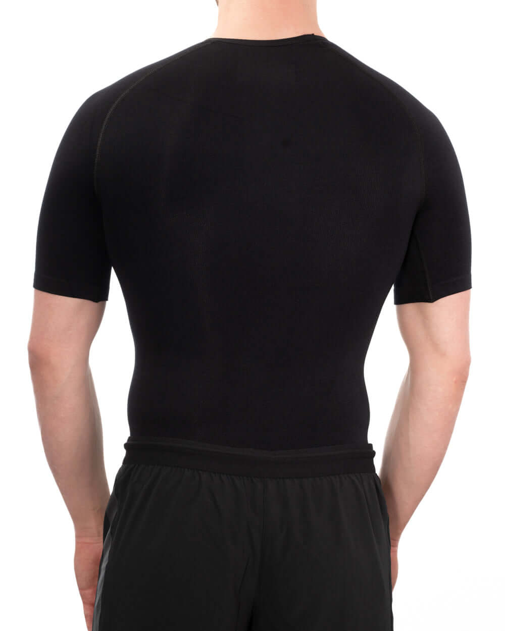 Men's seamless compression shirt in black, featuring a snug fit for comfort and support, ideal for everyday wear.