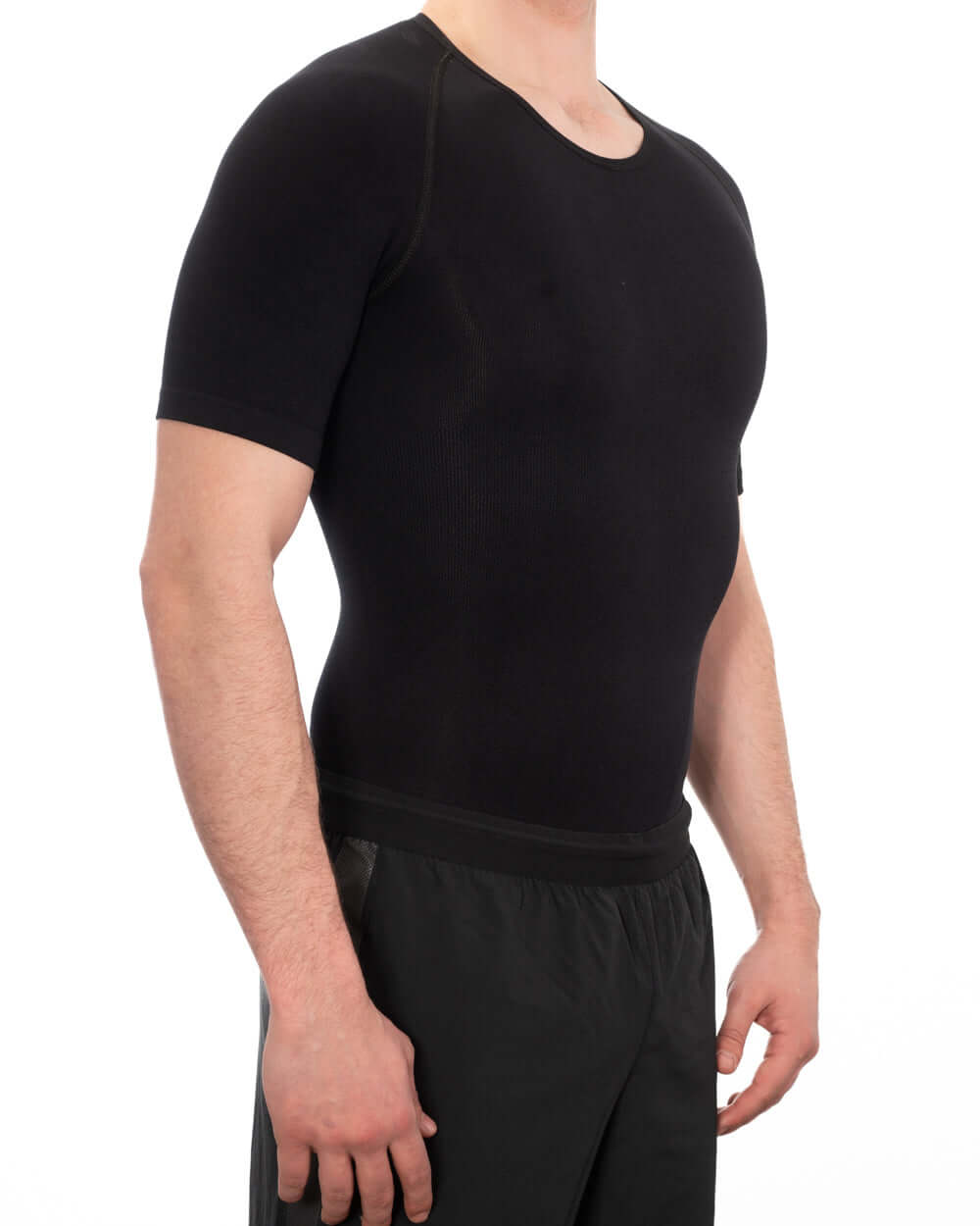 Men's seamless compression shirt in black, designed for comfort and body confidence.