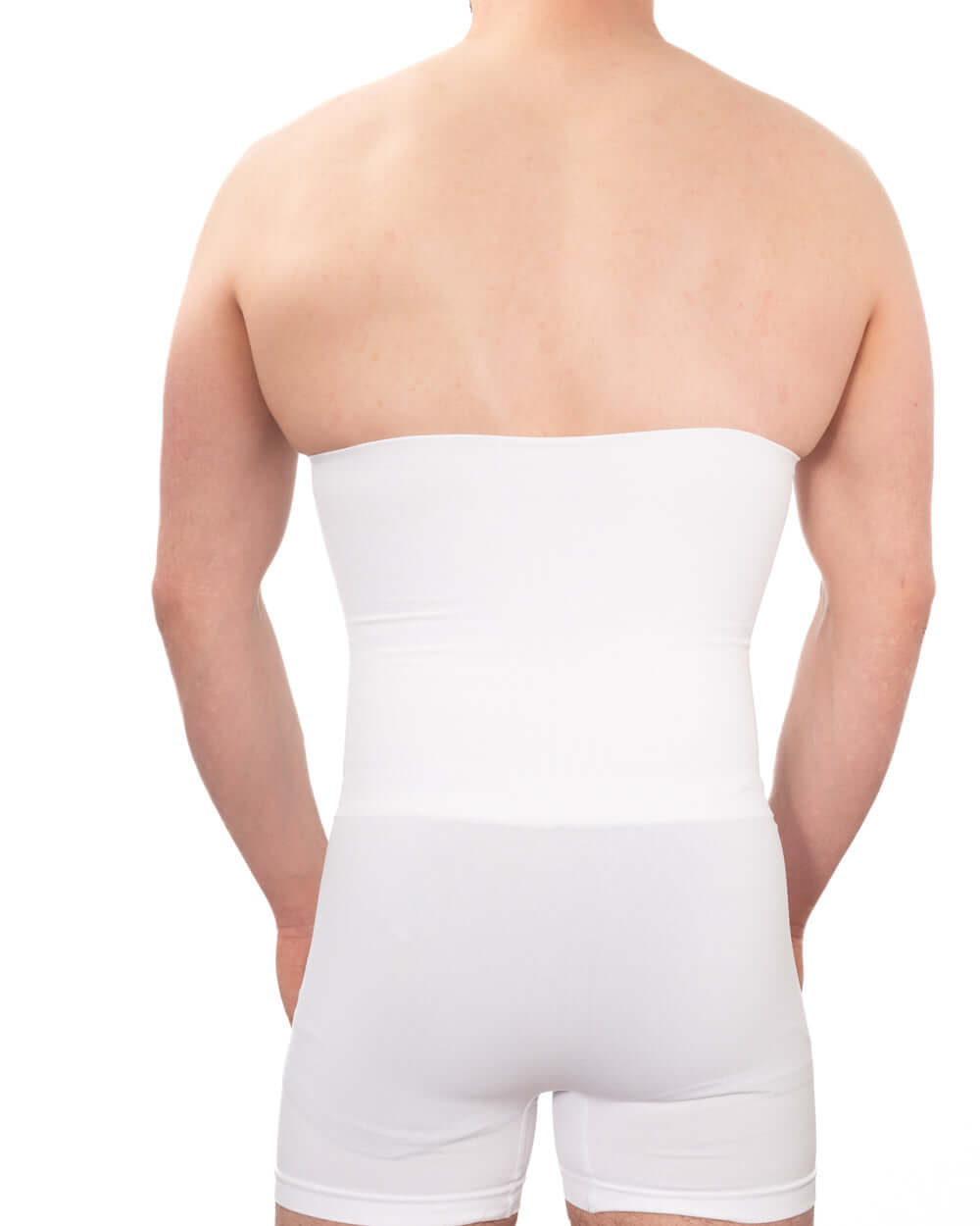 Back view of a man wearing a seamless men's girdle for maximum shaping and comfort under clothing.