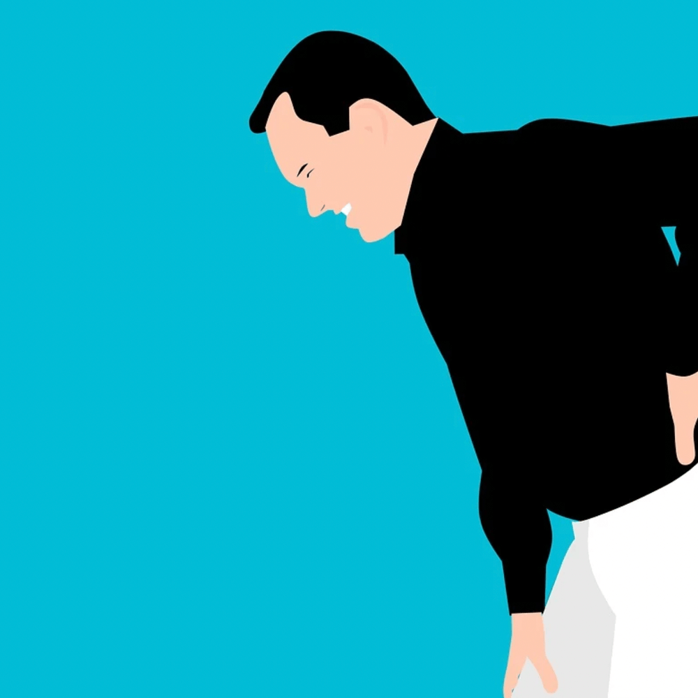 Illustration of a man in pain holding his lower back, representing back pain relief with men's shapewear.